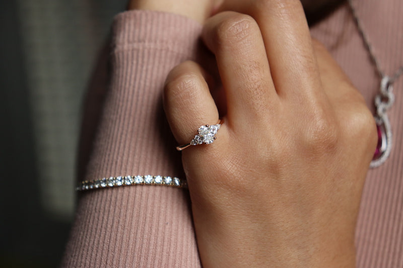18ct Rose Gold Oval, Round and Pear Cut Diamond Ring