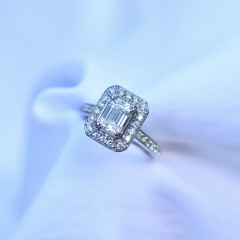 18ct White Gold Deco Style Emerald Cut Diamond Halo Ring