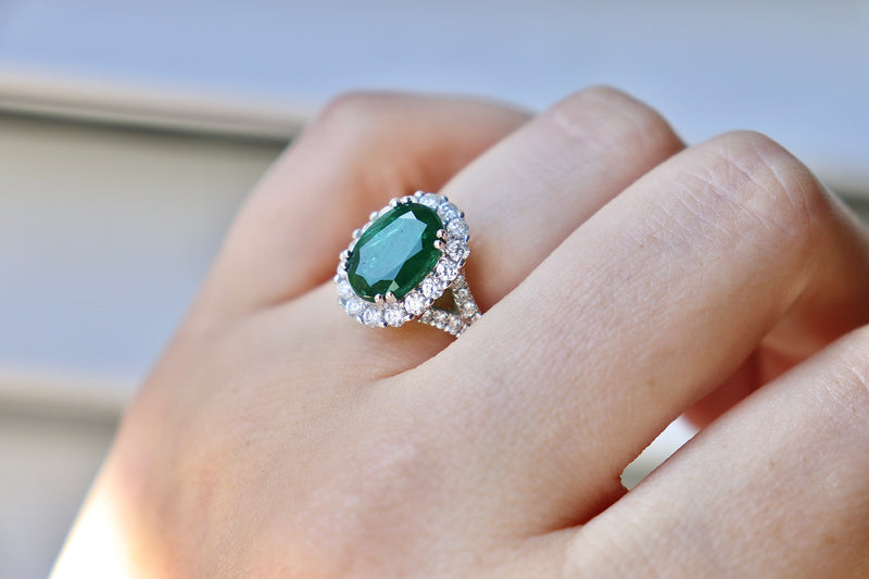 18ct White Gold Emerald and Diamond Halo Ring