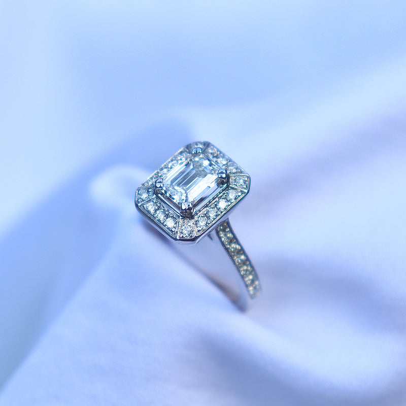 18ct White Gold Deco Style Emerald Cut Diamond Halo Ring