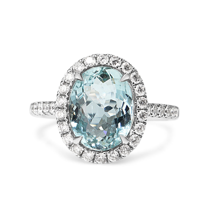 18ct White Gold Aquamarine and Diamond Halo Ring