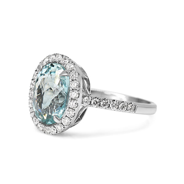 18ct White Gold Aquamarine and Diamond Halo Ring