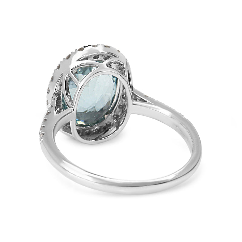 18ct White Gold Aquamarine and Diamond Halo Ring