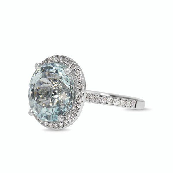 18ct White Gold Aquamarine and DIamond Halo Ring