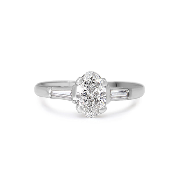 Platinum Oval and Baguette Diamond 3 Stone Ring
