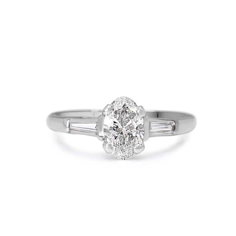 Platinum Oval and Baguette Diamond 3 Stone Ring