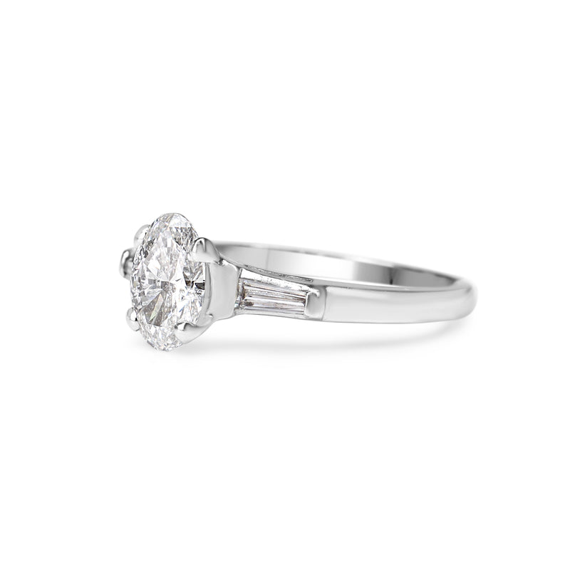 Platinum Oval and Baguette Diamond 3 Stone Ring