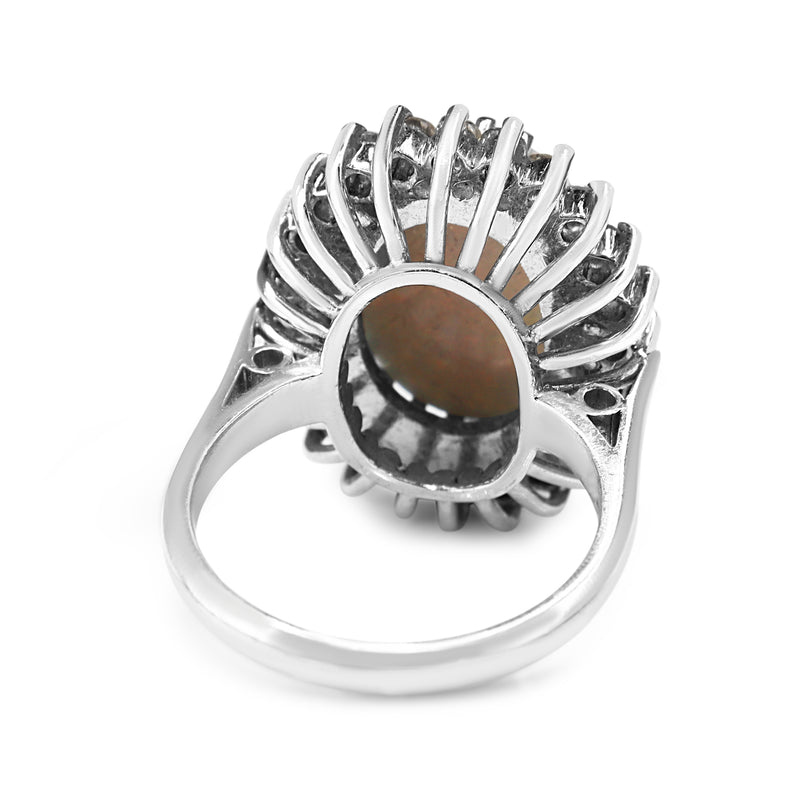18ct White Gold Opal and Diamond Halo Ring