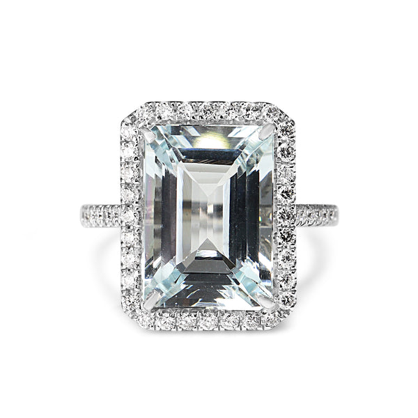 18ct White Gold Emerald Cut Aquamarine and Diamond Halo Ring
