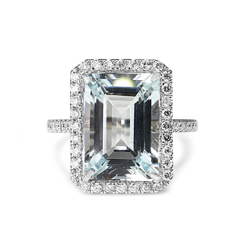 18ct White Gold Emerald Cut Aquamarine and Diamond Halo Ring