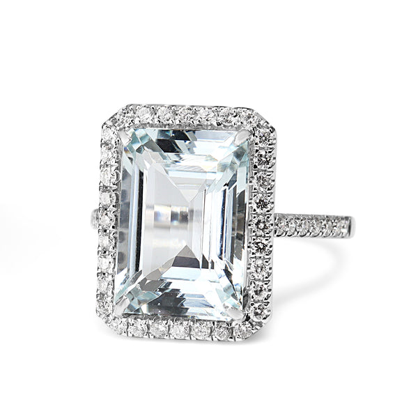18ct White Gold Emerald Cut Aquamarine and Diamond Halo Ring