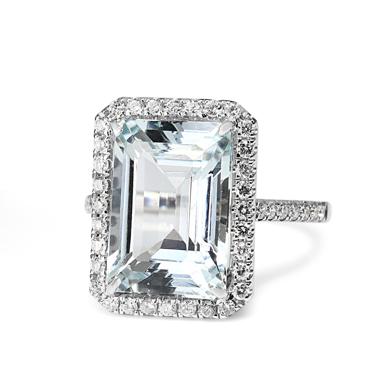 18ct White Gold Emerald Cut Aquamarine and Diamond Halo Ring