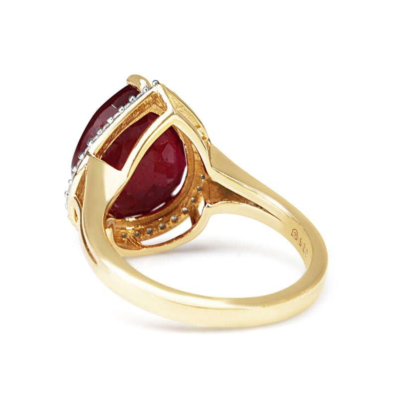 9ct Yellow and White Gold Treated Pear Shaped Ruby and Diamond Halo Ring