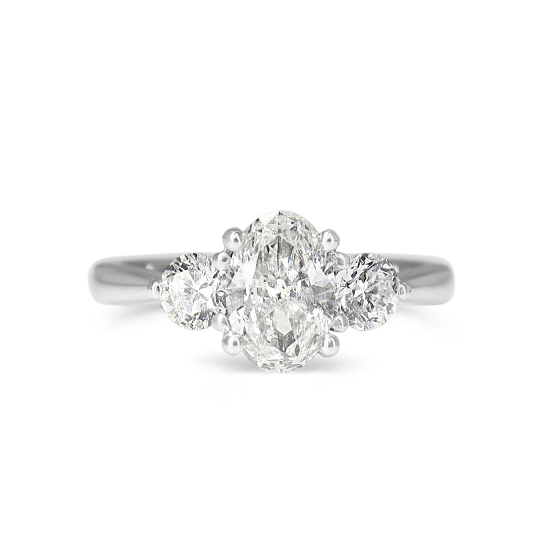 18ct White Gold Oval and Brilliant Cut Diamond 3 Stone Ring