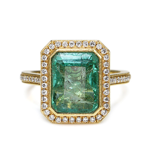 18ct Yellow Gold Emerald and Diamond Halo Ring