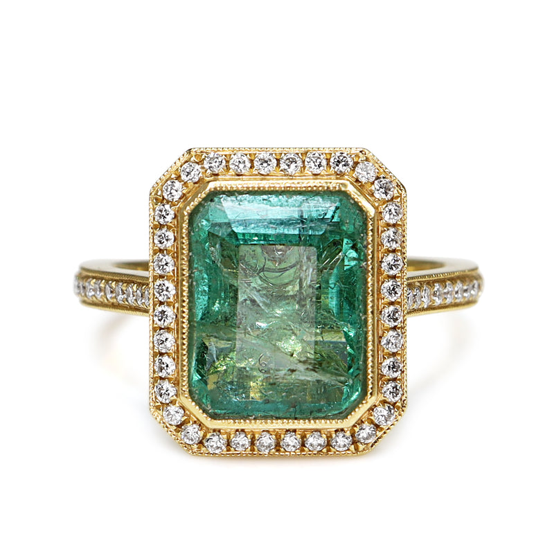 18ct Yellow Gold Emerald and Diamond Halo Ring