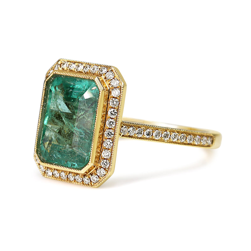 18ct Yellow Gold Emerald and Diamond Halo Ring