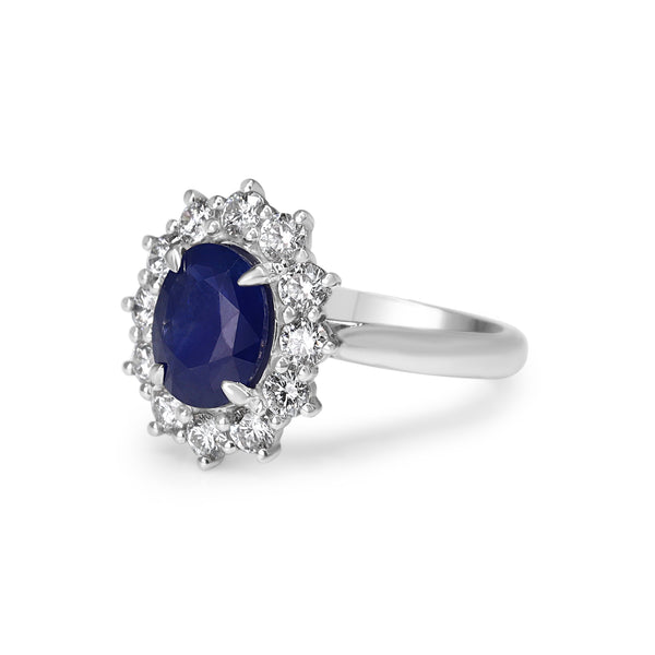 18ct White Gold Sapphire and Diamond Cluster Halo Ring