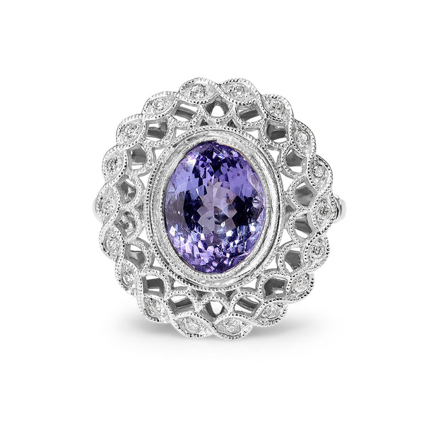 18ct White Gold Tanzanite and Diamond Fancy Halo Ring