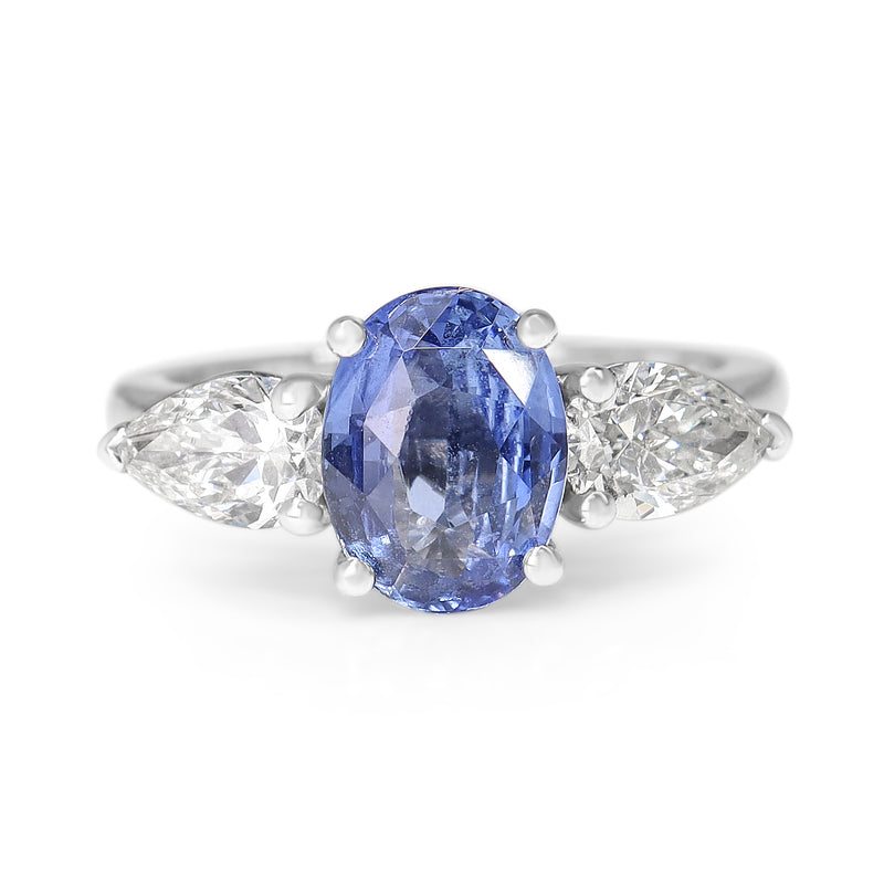 18ct White Gold Cornflower Blue Oval Sapphire and Pear Diamond 3 Stone Ring