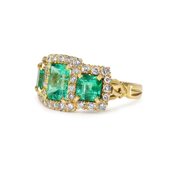 18ct Yellow Gold Emerald and Diamond 3 Stone Halo Ring
