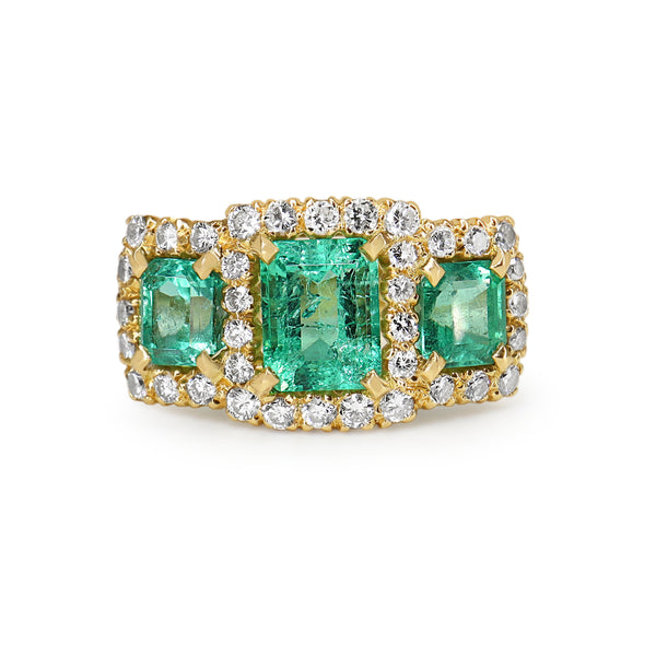 18ct Yellow Gold Emerald and Diamond 3 Stone Halo Ring