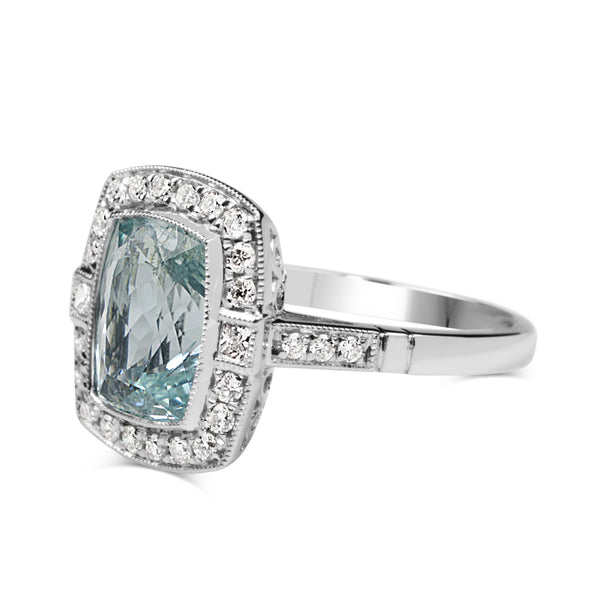 18ct White Gold Aquamarine and Diamond Halo Ring