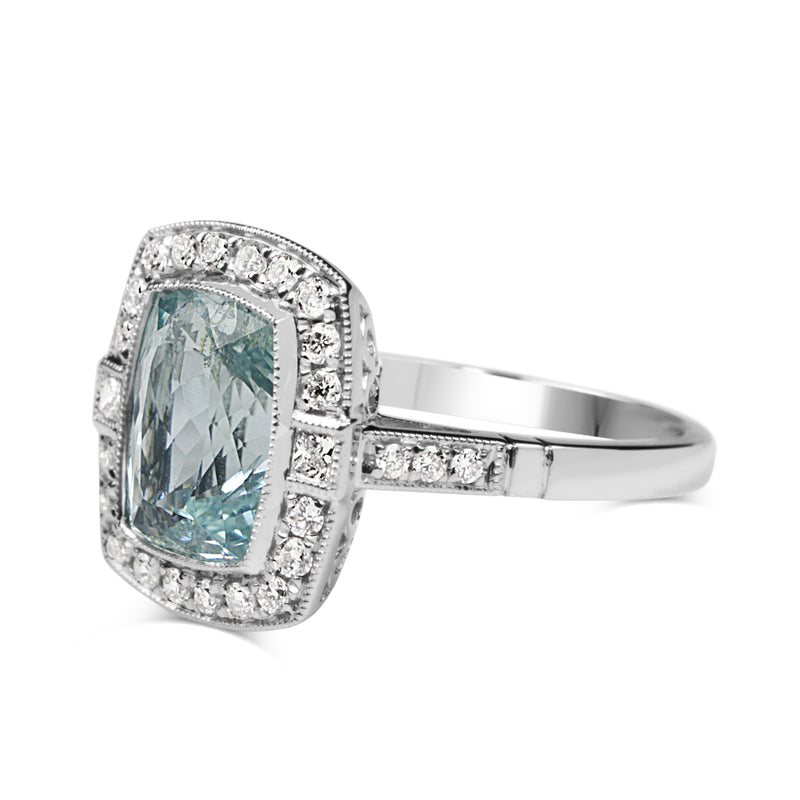 18ct White Gold Aquamarine and Diamond Halo Ring