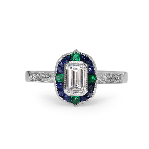 Platinum Emerald Cut Diamond with Sapphire and Emerald Art Deco Style Halo