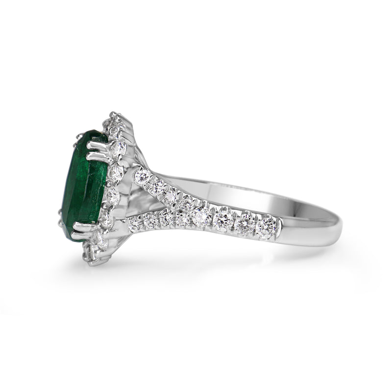 18ct White Gold Emerald and Diamond Halo Ring