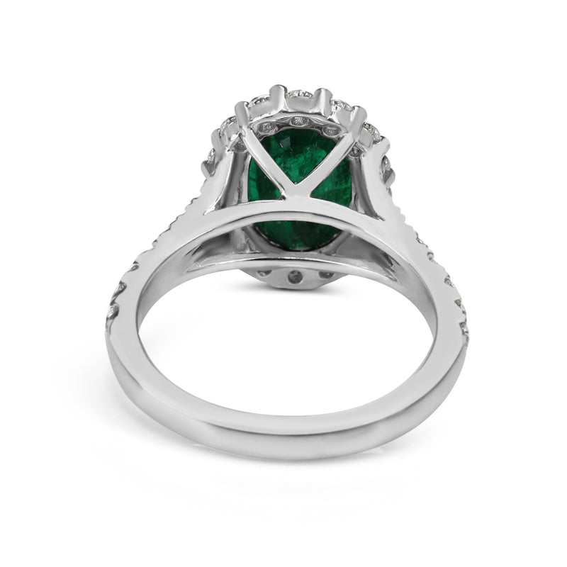 18ct White Gold Emerald and Diamond Halo Ring