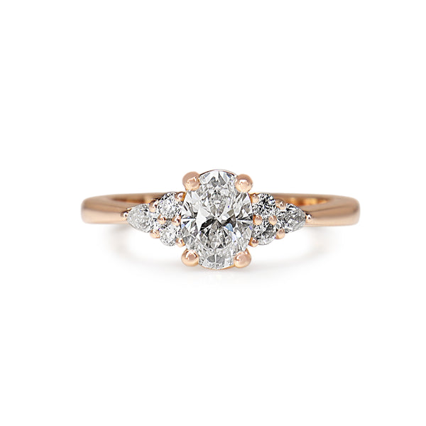 18ct Rose Gold Oval, Round and Pear Cut Diamond Ring