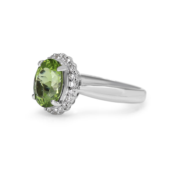 Platinum Peridot and Diamond Halo Ring