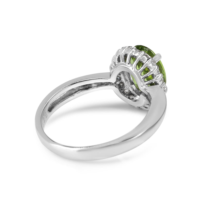 Platinum Peridot and Diamond Halo Ring