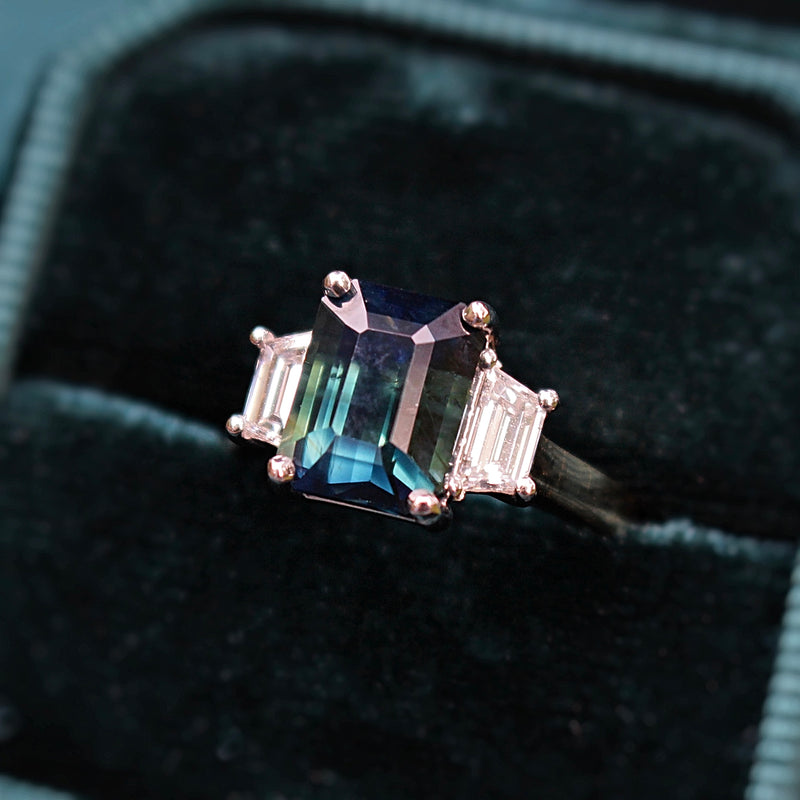 18ct Yellow and White Gold Teal/Parti Sapphire and Tapered Baguette Diamond 3 Stone Ring