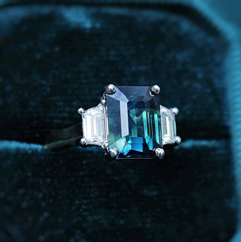 18ct Yellow and White Gold Teal/Parti Sapphire and Tapered Baguette Diamond 3 Stone Ring