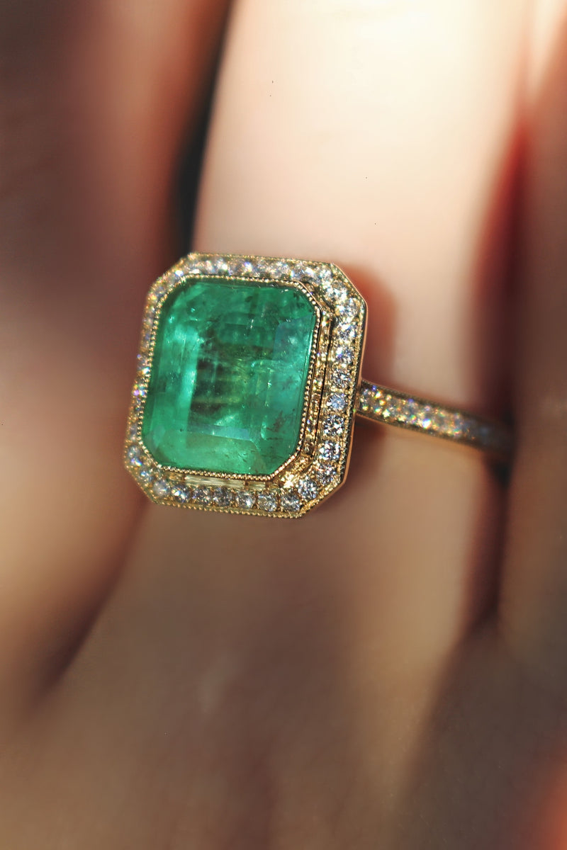 18ct Yellow Gold Emerald and Diamond Halo Ring