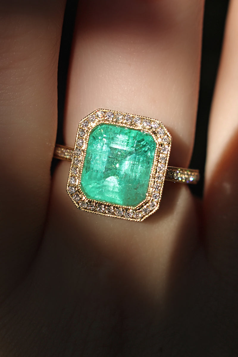18ct Yellow Gold Emerald and Diamond Halo Ring