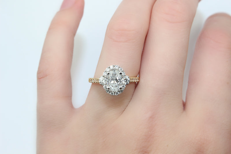 18ct Yellow and White Gold Oval Halo Diamond Ring