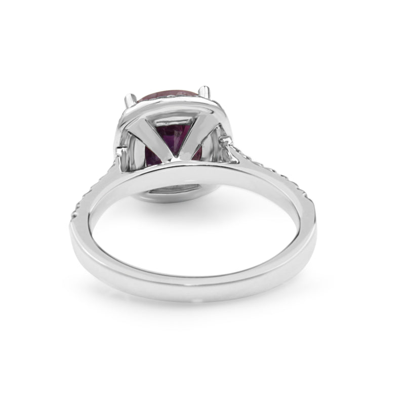18ct White Gold Pink Sapphire and Diamond Halo Ring