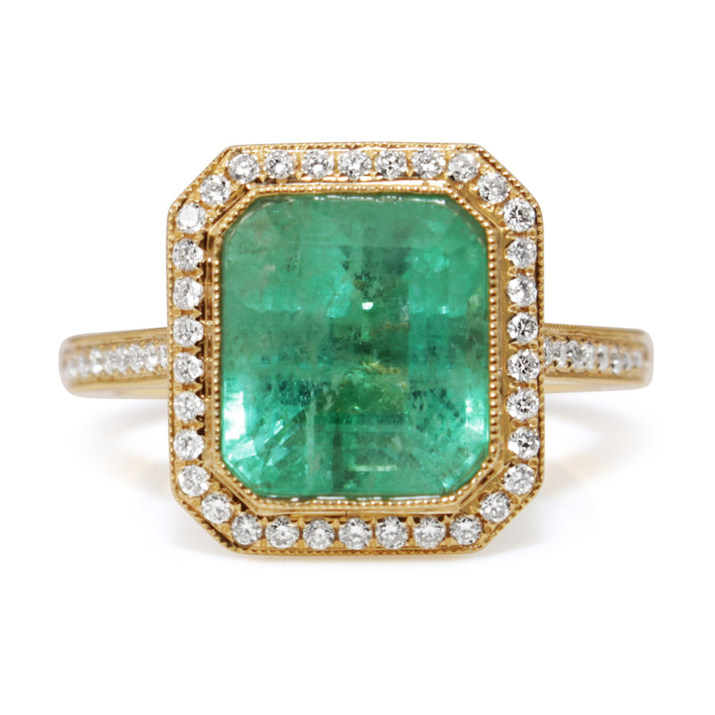 18ct Yellow Gold Emerald and Diamond Halo Ring