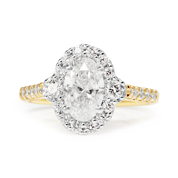 18ct Yellow and White Gold Oval Halo Diamond Ring