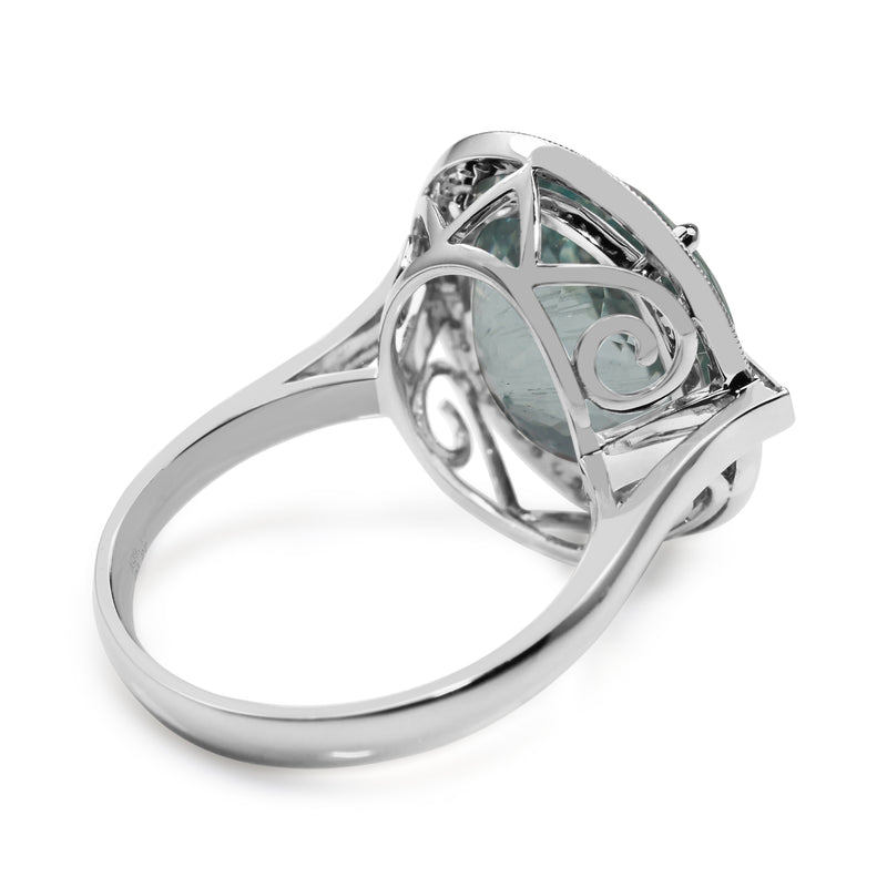 18ct White Gold Aquamarine and Diamond Halo Ring