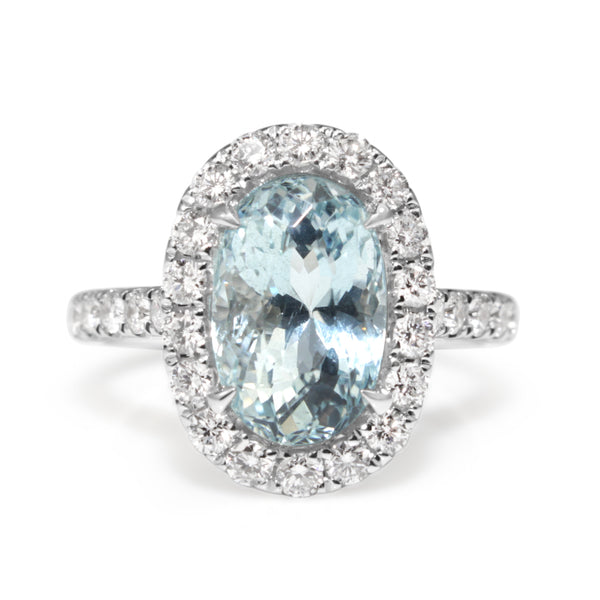 18ct White Gold Aquamarine and Diamond Halo Ring
