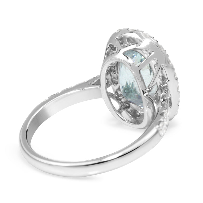 18ct White Gold Aquamarine and Diamond Halo Ring