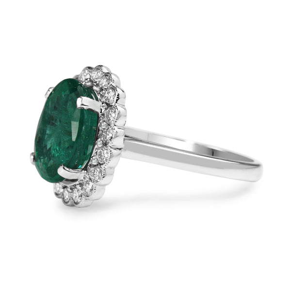 18ct White Gold Emerald and Diamond Daisy Style Ring