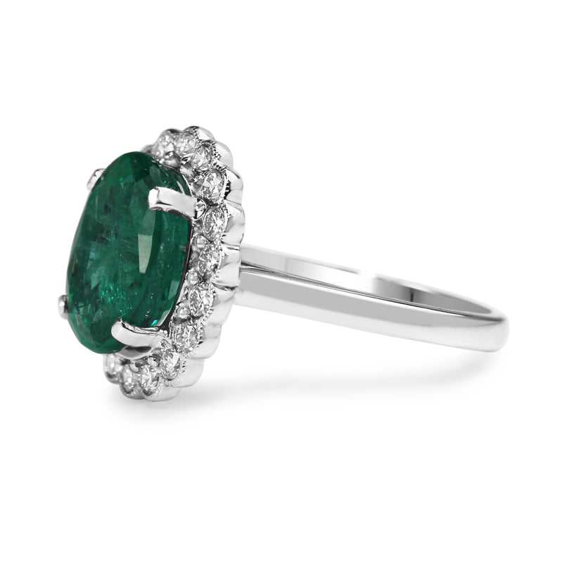 18ct White Gold Emerald and Diamond Daisy Style Ring