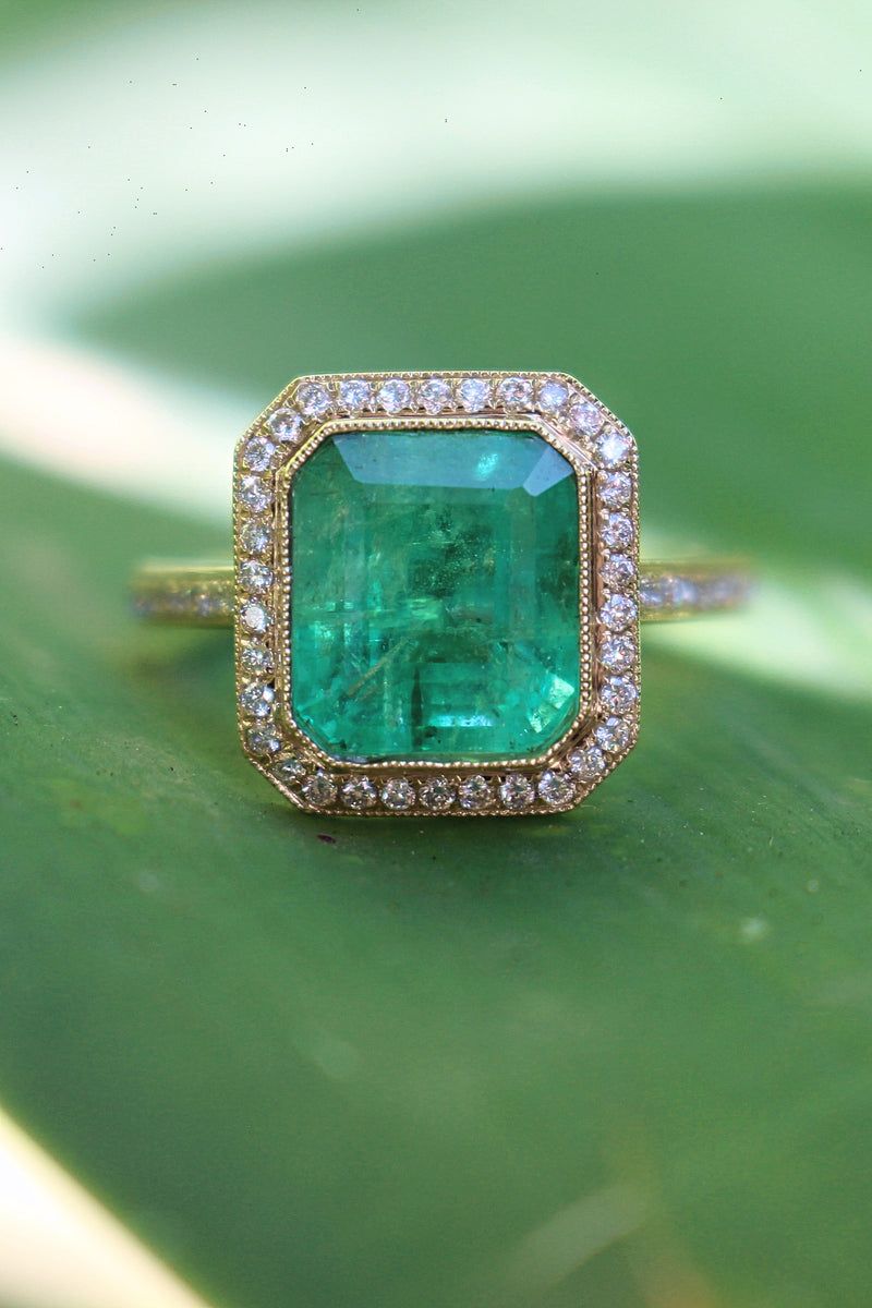 18ct Yellow Gold Emerald and Diamond Halo Ring