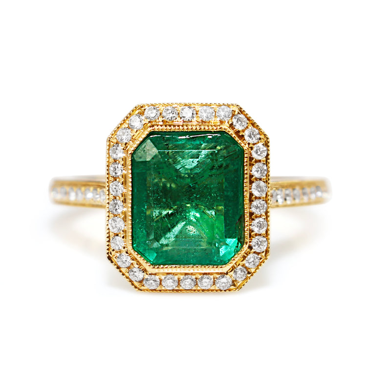 18ct Yellow Gold Emerald Cut Emerald and Diamond Halo Ring