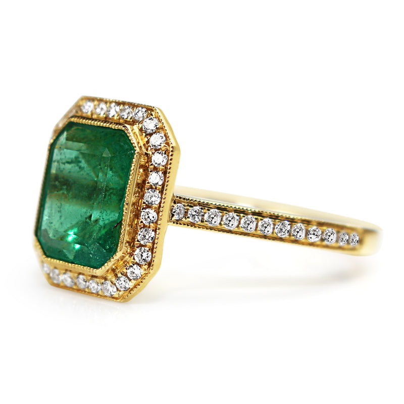 18ct Yellow Gold Emerald Cut Emerald and Diamond Halo Ring